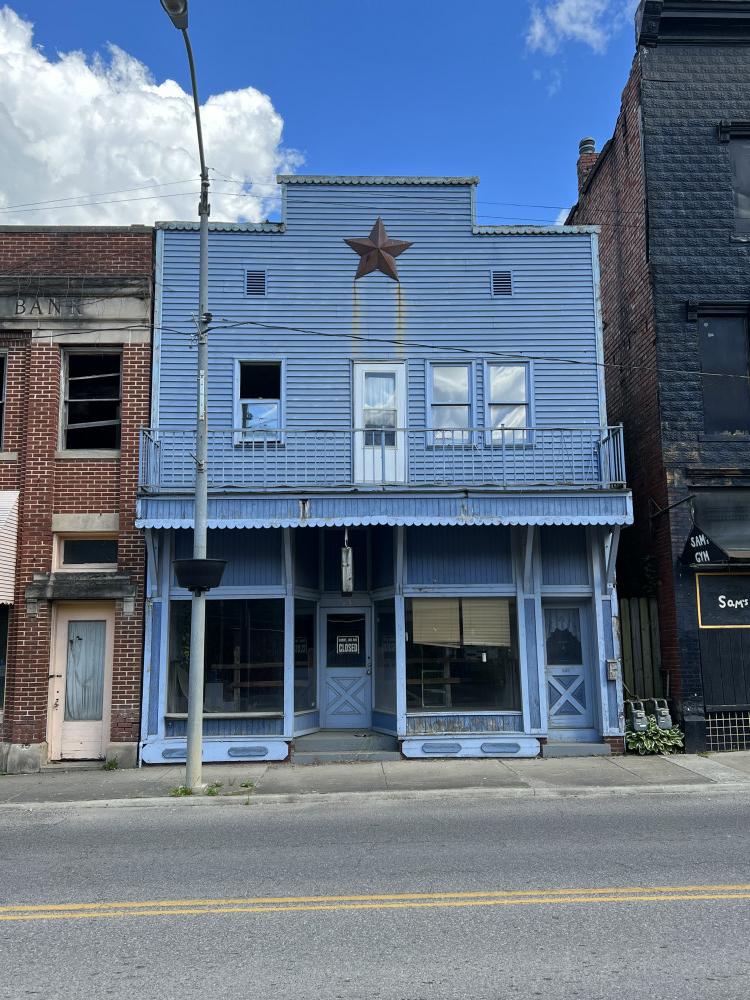 73 High Street, Glouster, Ohio, blue commercial building downtown Glouster